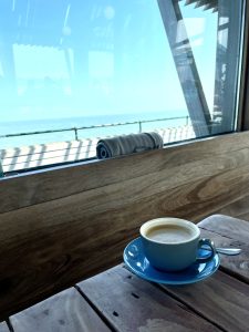 Picture of a cup of coffee on a table in Deal Pier Kitchen in Deal Kent shot taken by The House in Deal in Deal Kent