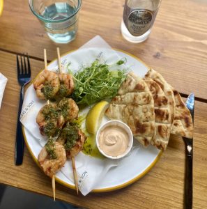 Grilled prawns with flat breads and gremolata sauce shot by The House in Deal Holiday Cottage