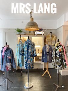 Picture os a shop showroom full of fabulously embroidered and opulent coats shot taken by The House in Deal a holiday cottage to rent in Deal on the Kent Coast