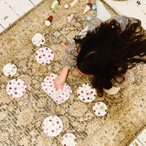 february hafl term a picture of a child playing with a tea set at the House in Deal